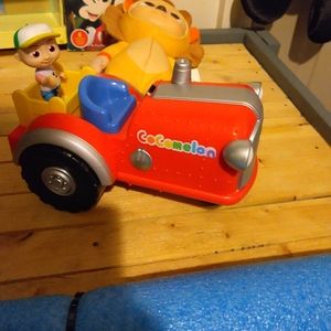CoComelon Official Musical Tractor w/ Sounds & Exclusive 3-inch Farm JJ Toy